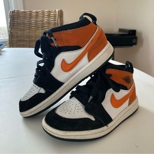 Jordan 1 mids kids size 12 orange/black